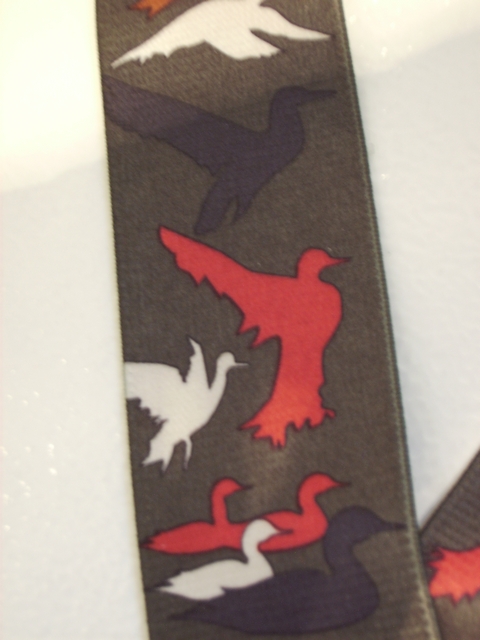 DUCK SILHOUETTES OLIVE 2"X48" Suspenders with 4 strong 1"x 1" Stainless Steel Grips and 2 Secure Stainless Steel Length Adjusters in the front. Entirely Stretchable Hand Washable and Hang to Dry Cotton/Polyester Material. UA220N48DUOD